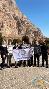 Tourists in Iranian Traditional Hotel Caravanserai in Kermanshah